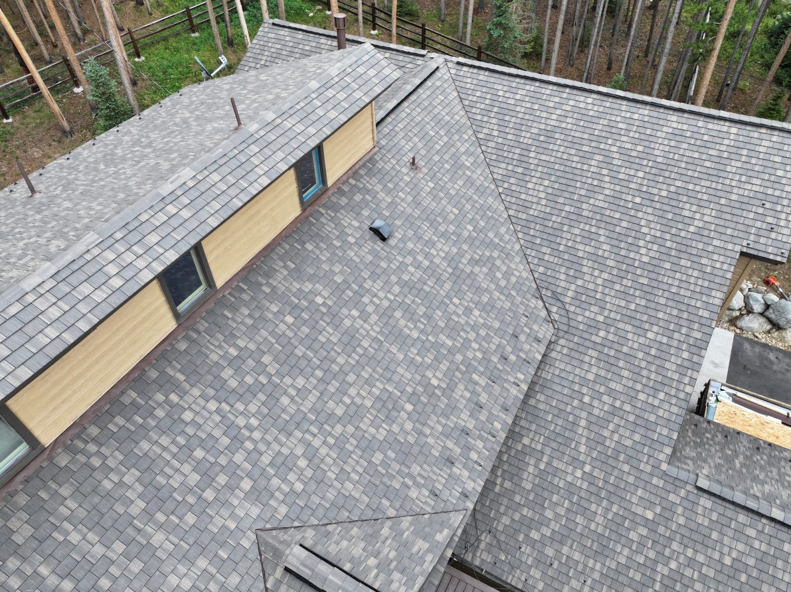 F-Wave REVIA hand split shake synthetic shingles in Castlewood Brown on a mountain home in Breckenridge, Colorado
